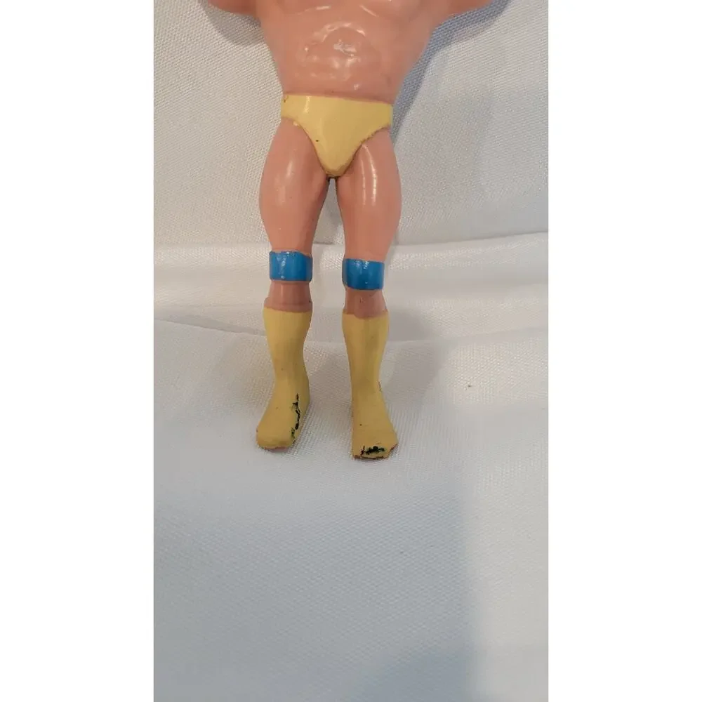 Vintage Hulk Hogan Wrestling Action Figure Yellow Blue WWF WWE Figure